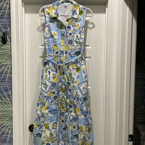 Great cotton summer dress,
Cotton and lined. Think Italy!